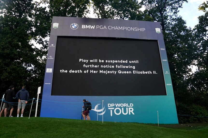 A screen displays a message that play has been suspended following the announcement of the death of Queen Elizabeth II.