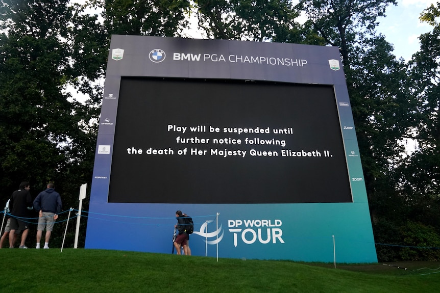 A screen displays a message that play has been suspended following the announcement of the death of Queen Elizabeth II.