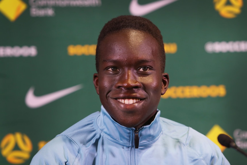 Socceroo Garang Kuol looking smiling