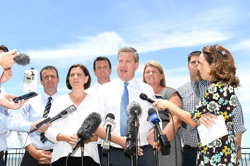 Tim Nicholls and Deputy Leader of the Opposition Deb Frecklington speak at a press conference