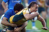 Quade Cooper scores a late try against Italy