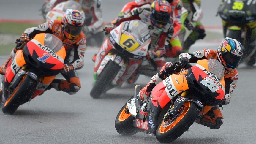 Spain's Dani Pedrosa (#26) leads the Malaysian MotoGP which he went on to win.