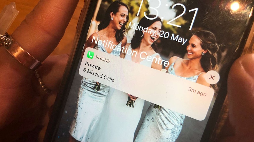 A mobile phone screen shows six missed calls from a private number.