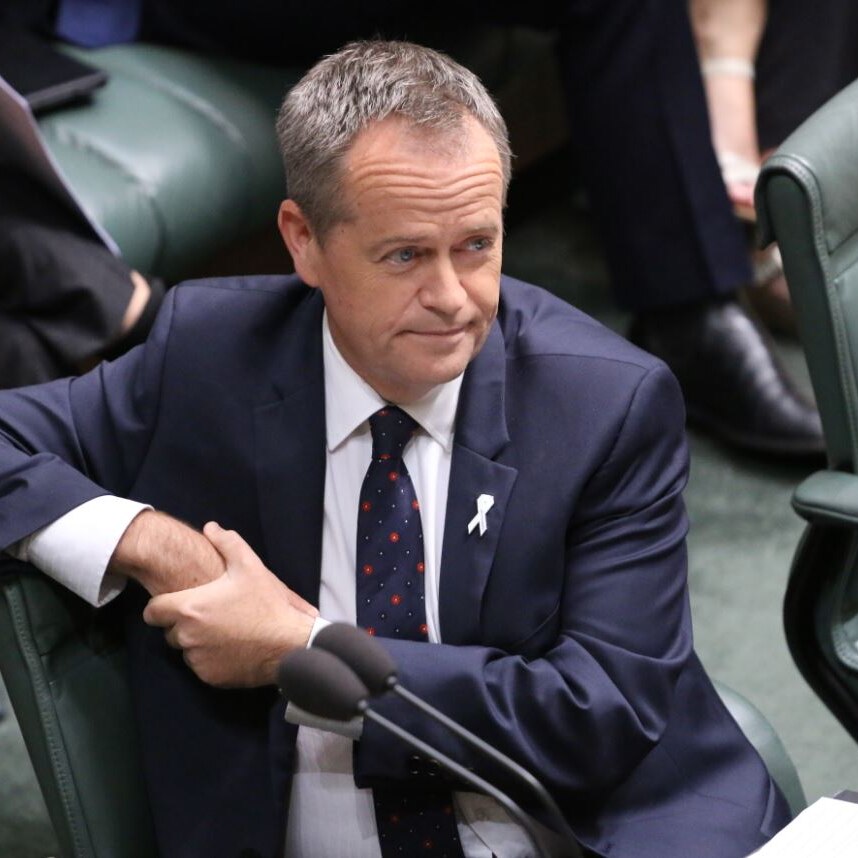 Bill Shorten listens in Parliament House during Question Time