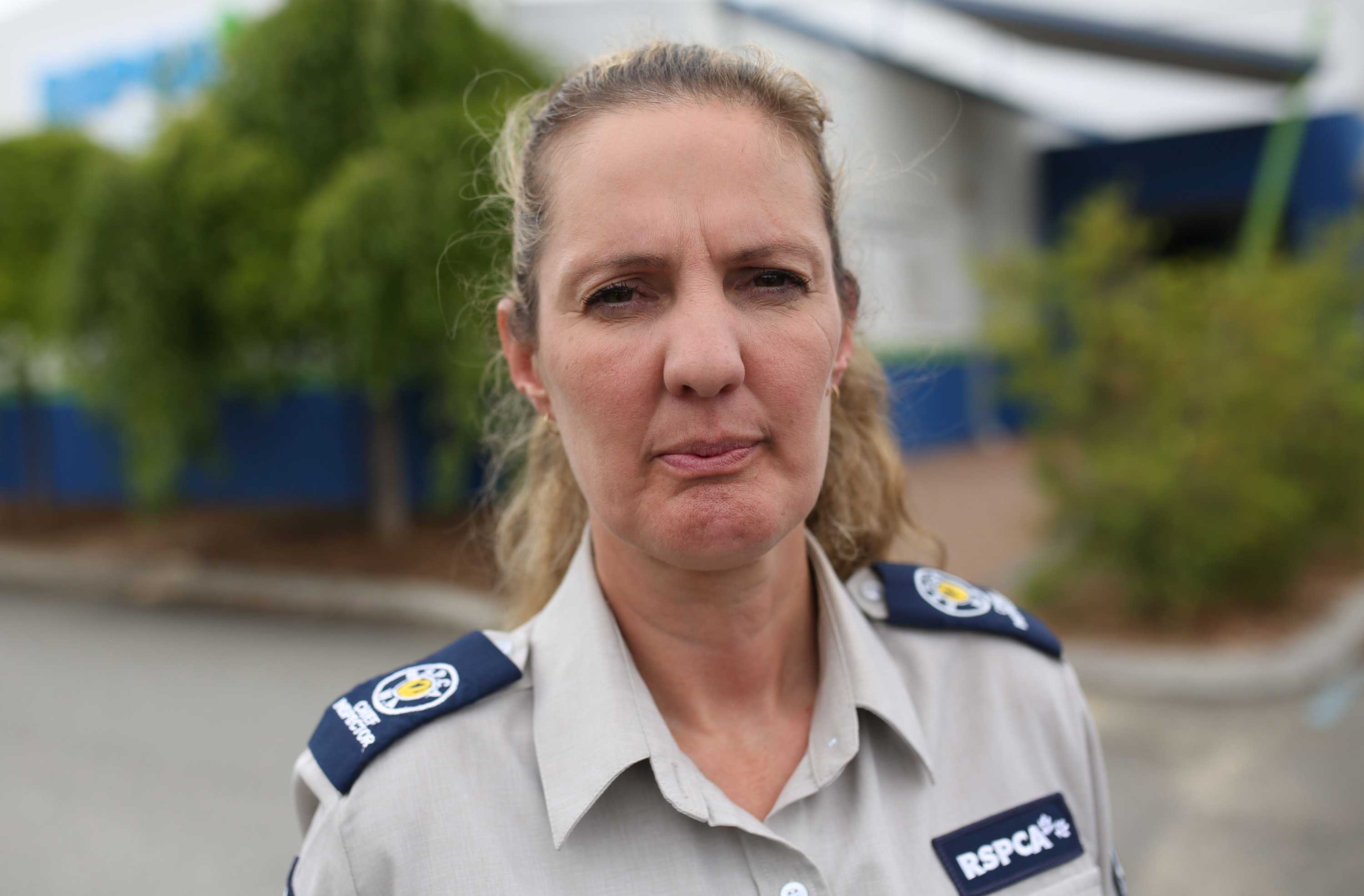 RSPCA Chief Inspector Amanda Swift in her uniform outside the Association's offices