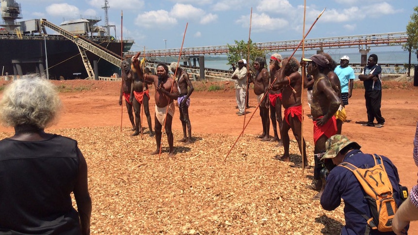 Tiwi people celebrate the first shipment of woodchips