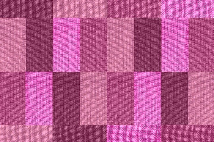Photo of a piece of fabric in various shades of purple on rectangle shapes
