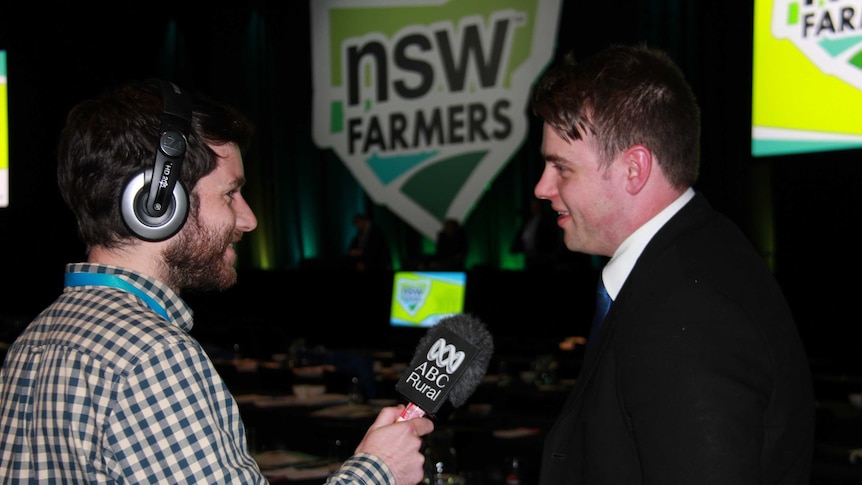 Josh Gilbert District Chair of the NSW Young Farmers speaking to Josh Becker