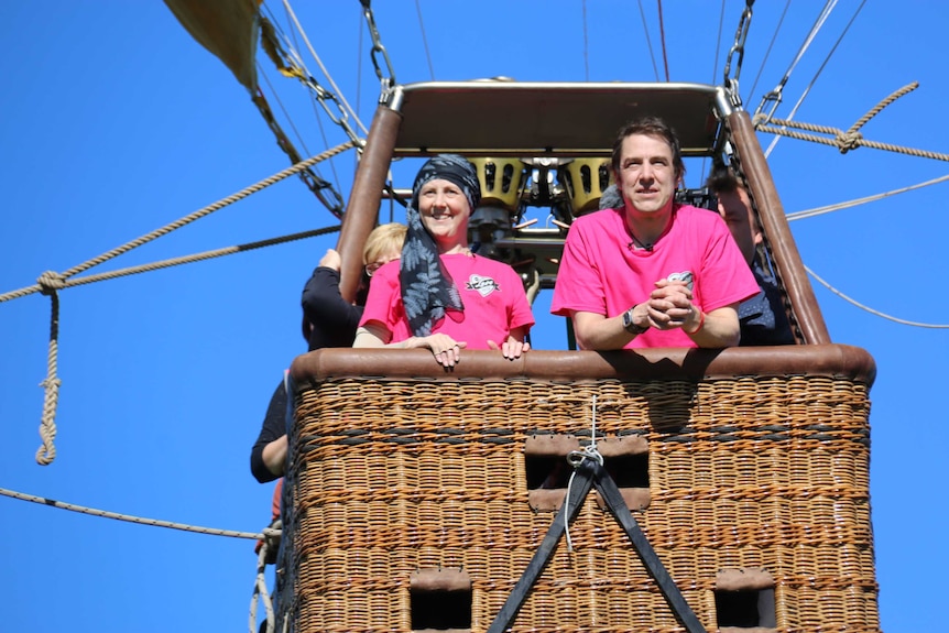 Connie and Samuel Johnson looking out of a hot air balloon in Canberra