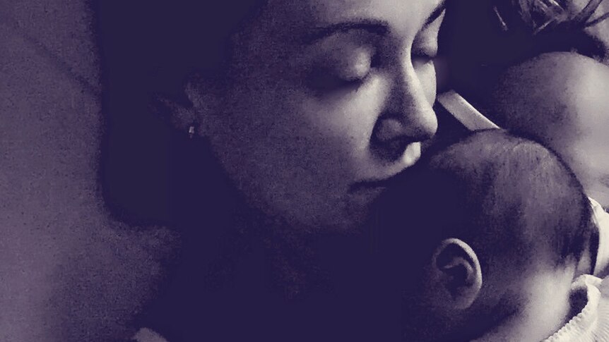 Michelle Bridges with baby son Axel in 2016