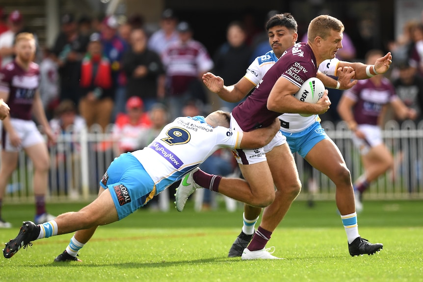 Tom Trbojevic makes a carry for Manly against Gold Coast