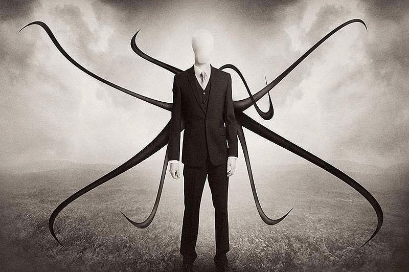 A drawing of the Slender Man character, in a suit with tentacles coming from his back.