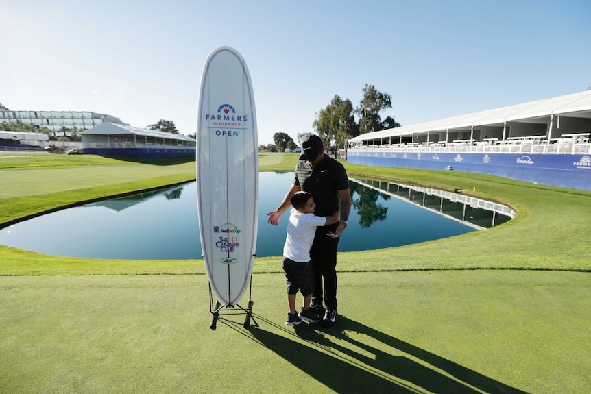 Jason Day gets a hug from his son Dash after winning the San Diego US PGA Tour event.