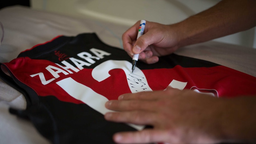 An Essendon Bombers guernsey with Zahara's name printed on the back.