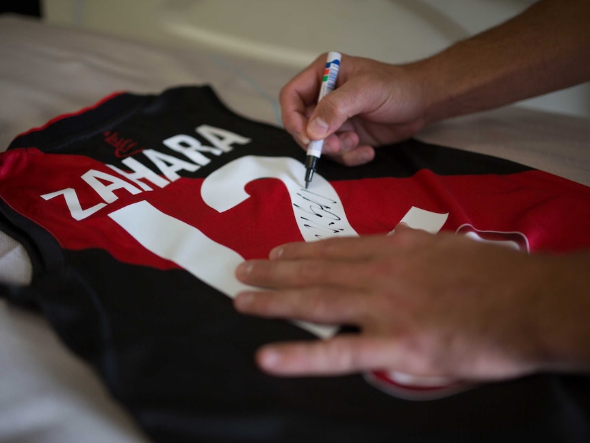 An Essendon Bombers guernsey with Zahara's name printed on the back.