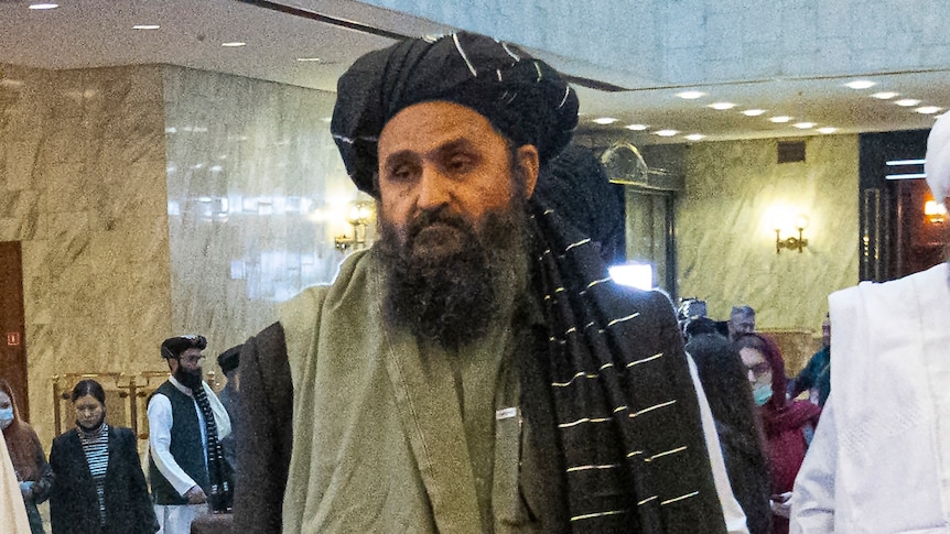 Mullah Abdul Ghani Baradar wearing Afghan attire.