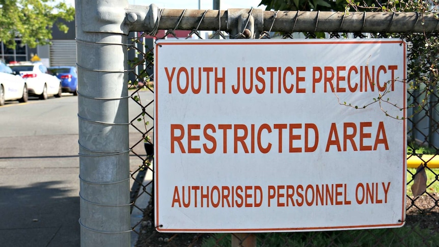 A sign outside the Parkville youth justice centre reads: "Youth justice precinct. Restricted area. Authorised personnel only."