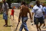 Residents gather on Palm Island