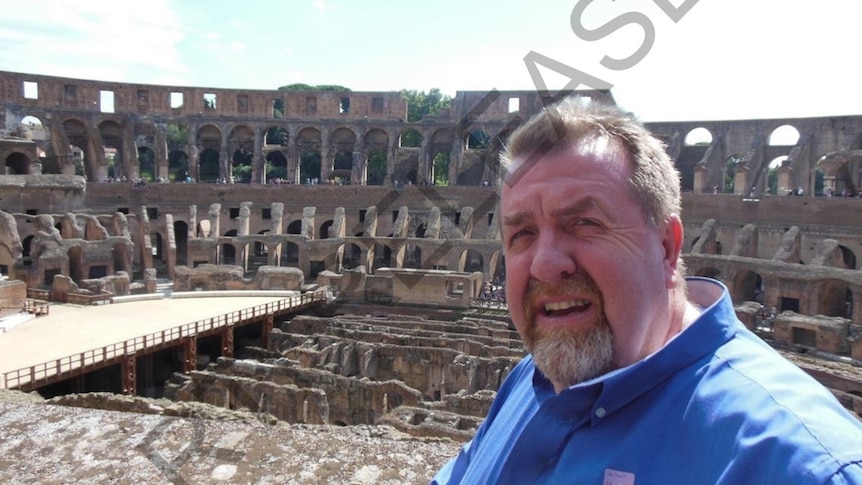 Paul Tully takes a selfie at the Colosseum in Italy in 2012.