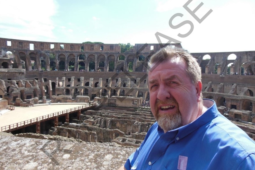 Paul Tully takes a selfie at the Colosseum in Italy in 2012.