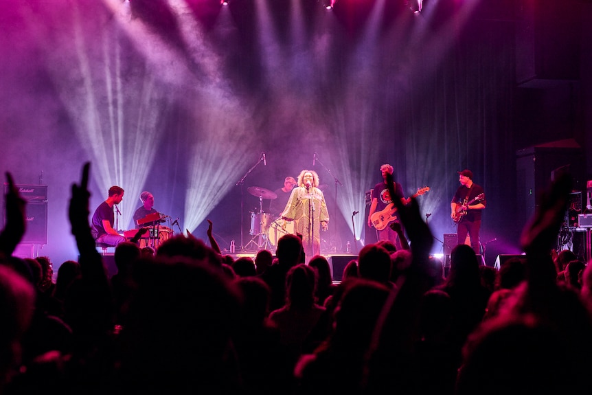 Musical performers on stage.