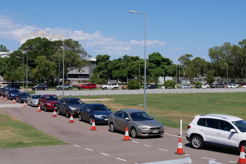 People in cars queuing for a COVID-19 test at Reid Park in Townsville