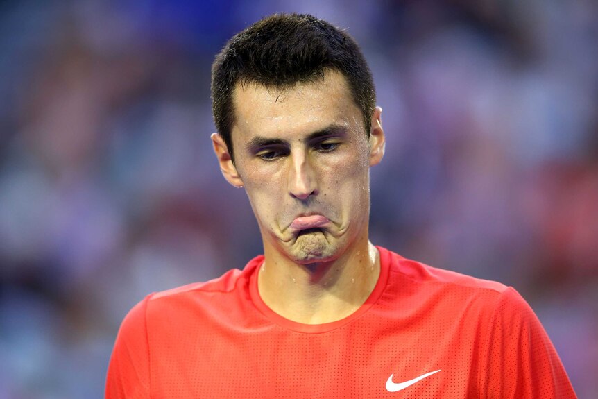 Bernard Tomic reacts