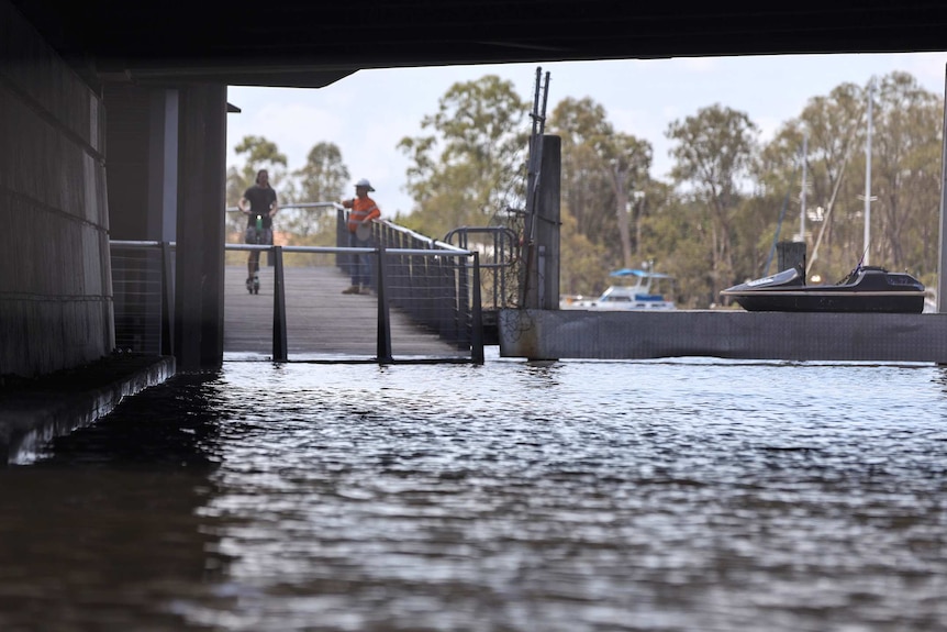 High tide underneath a bridge at Breakfast Creek, Newstead in Brisbane on February 2, 2019.