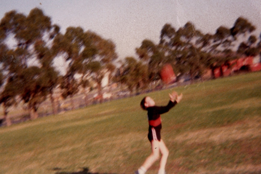 Adam Kneale circa 1982 footy in the parkJPG