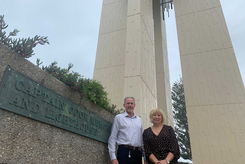 Gold Coast City Councillor Gail O'Neill and Tweed Shire Council's Stewart Brawley in front of the Point Lookout lighthouse