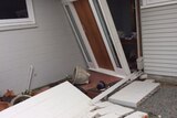 The earthquake lifted the door to Anthea Prentice's home from its frame.