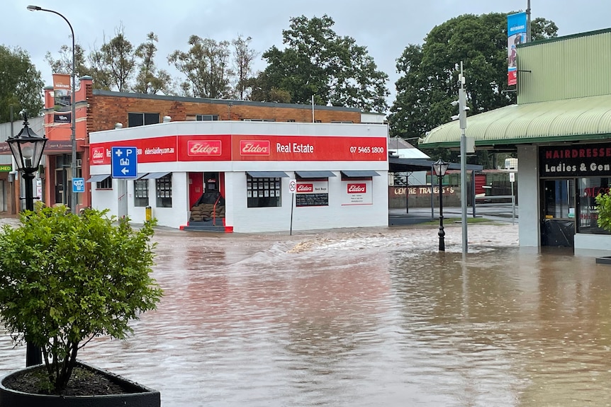 Elders Real Estate in Laidley during floods, sandbads on steps