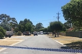 Police tape is stretched across the road at Bullsbrook where a body has been found.