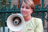 Queensland's Premier Anna Bligh speaks at a gay rights rally outside Parliament House in Brisbane