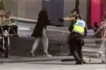 A policeman shoots the Bourke Street attacker
