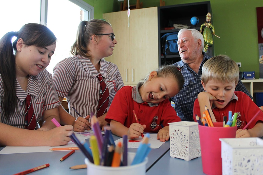 Poppy Wallace helps in the classroom.