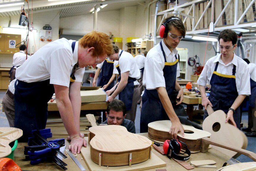 Students making their own guitars