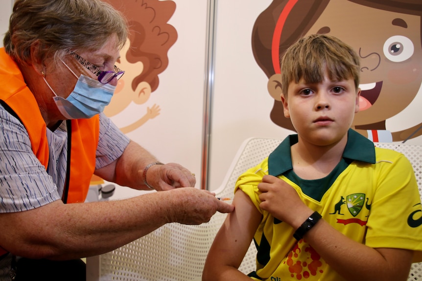 Lachlan Best getting his first COVID vaccination in Perth.