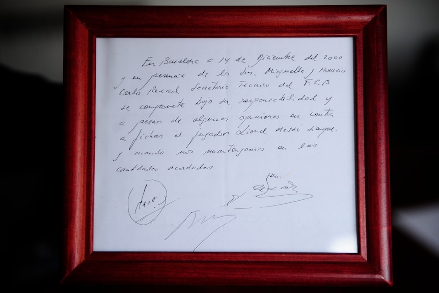 A framed napkin from Barcelona's signing of Lionel Messi.