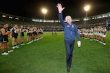 Malthouse waves to the MCG crowd