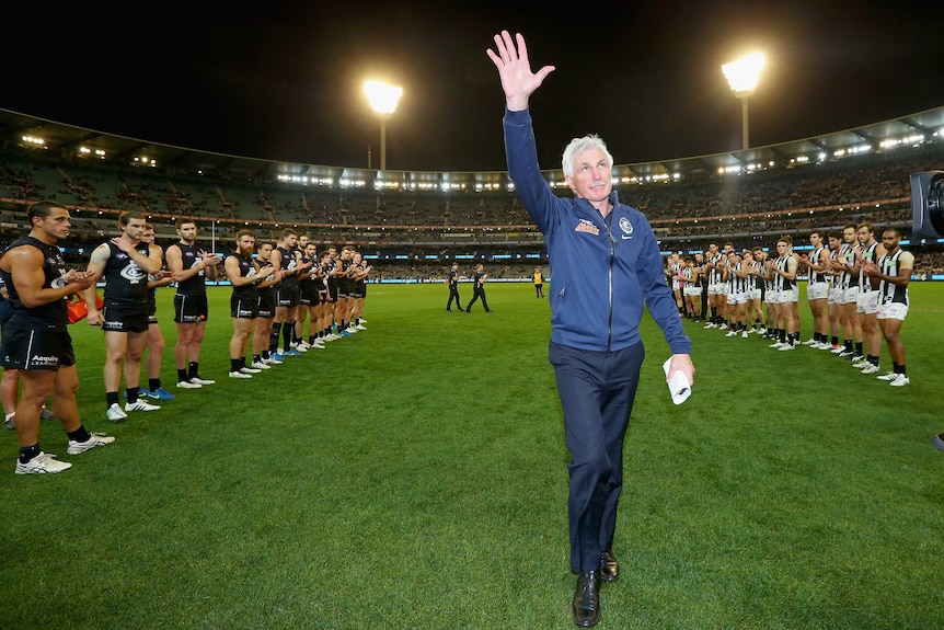 Malthouse waves to the MCG crowd