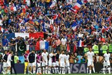 France players and supporters celebrate after the quarterfinal match.