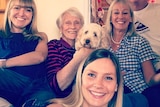 Rebecca Armitage takes a selfie with her family, including her sister, grandma, mum, dad and family dog