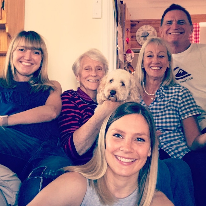 Rebecca Armitage takes a selfie with her family, including her sister, grandma, mum, dad and family dog