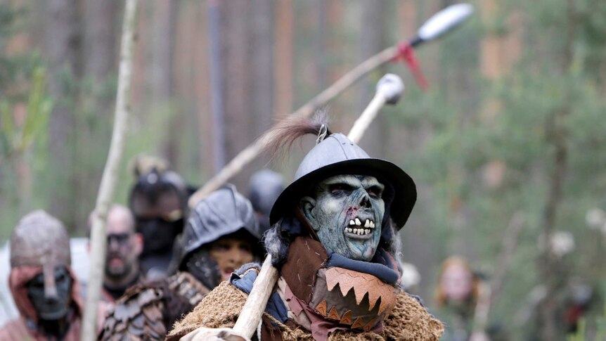 A team of people dressed as orcs from J.R.R. Tolkien's novel "The Hobbit".