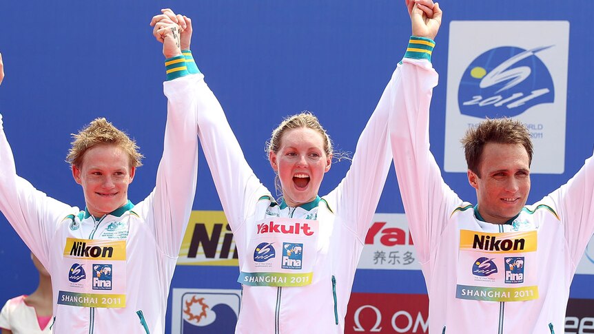 Silver lining ... Rhys Mainstone, Melissa Gorman and Ky Hurst celebrate second place in China.