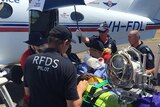 RFDS crews transport a patient from Kowanyama