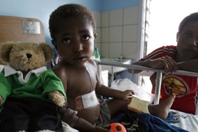 Child in hospital bed, file photo (AFP: Torsten Blackwood)