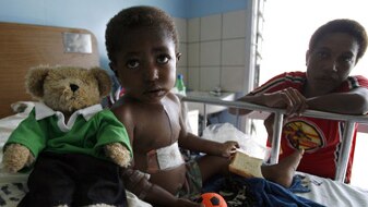 Child in hospital bed, file photo (AFP: Torsten Blackwood)