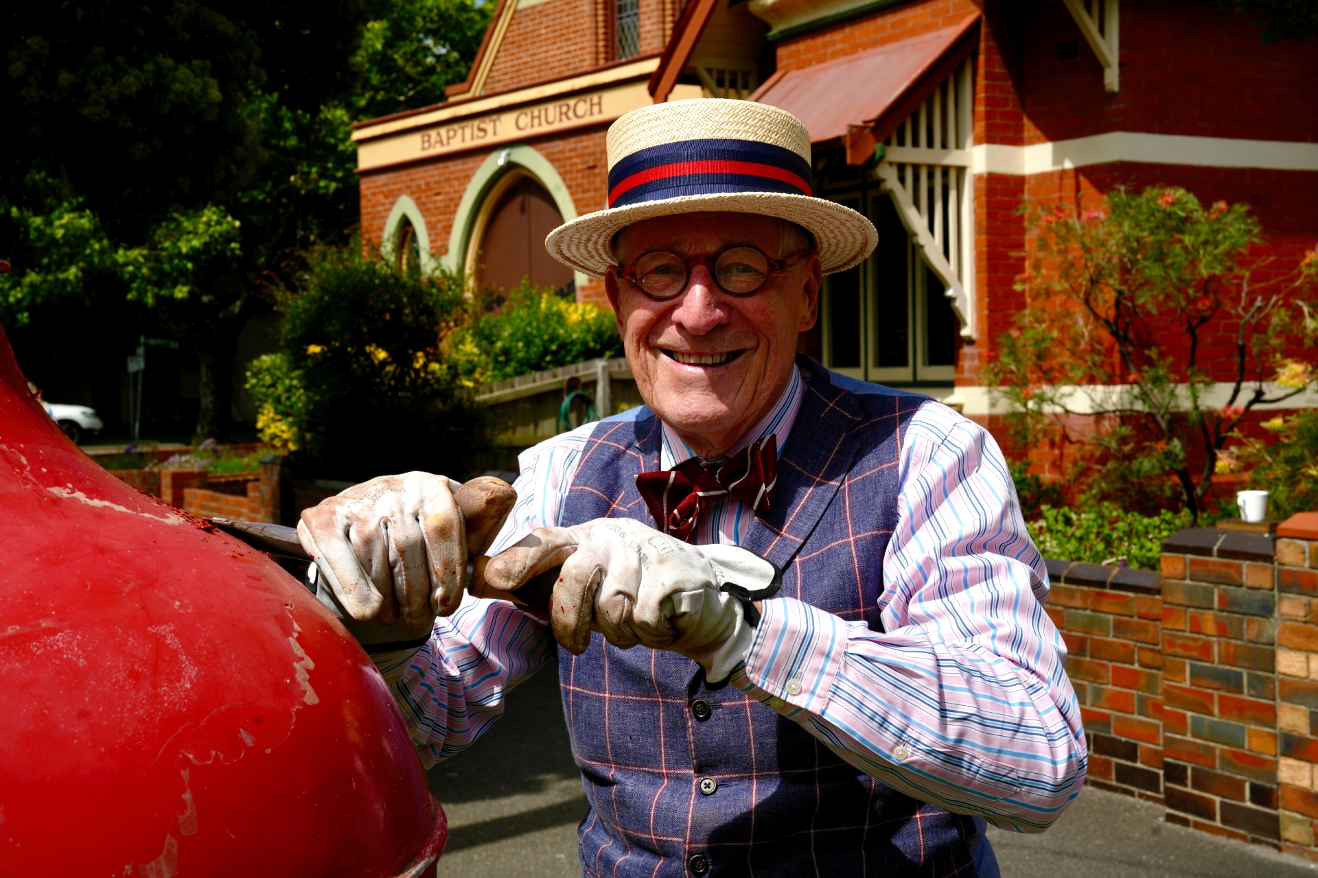 Mick Slocum raspando uma caixa de correio em Albert Park, Victoria